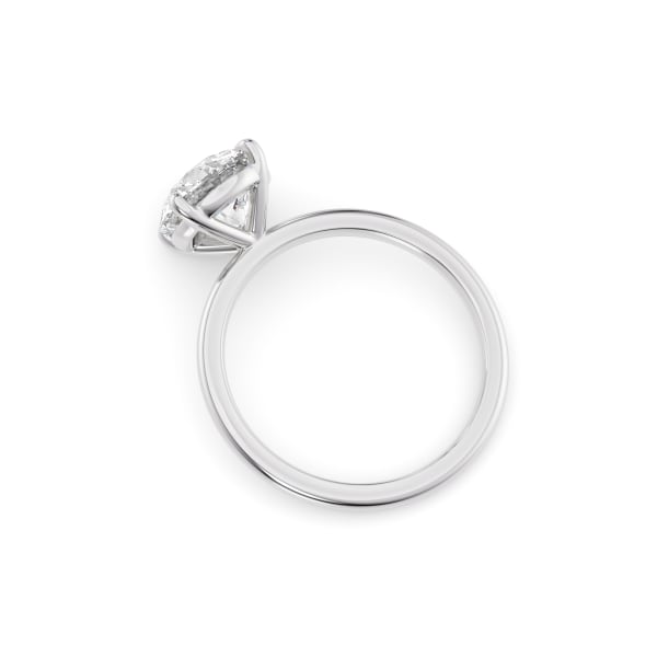 Silver ring with a large gemstone on a white background