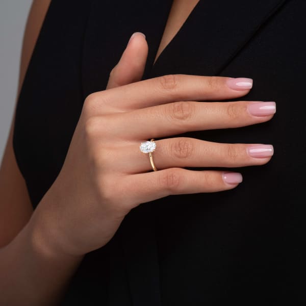 Oval Cut Moissanite Four Prong Solitaire Engagement Ring