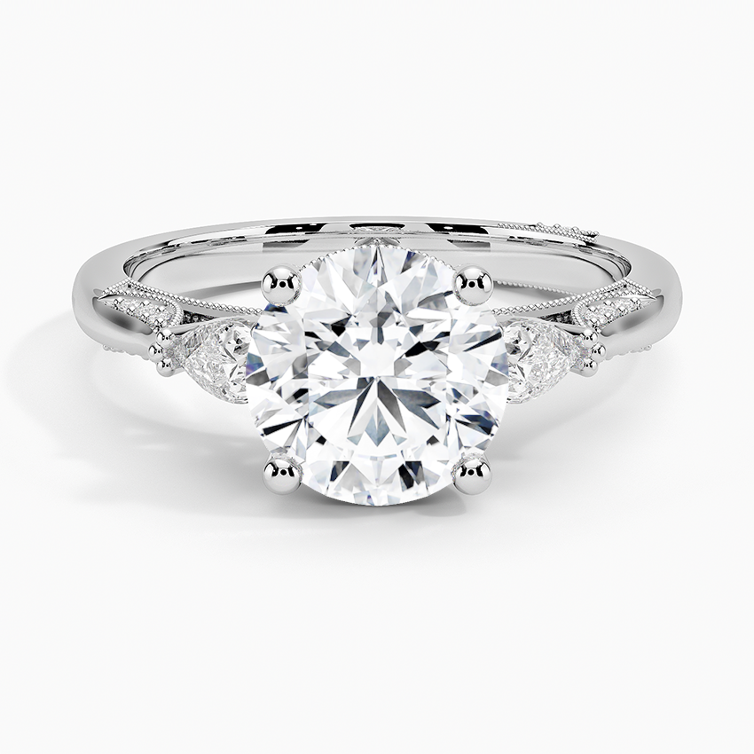 Round Brilliant Cut Diamond Engagement Ring with Pear Side Stones, plit Shank Milgrain Band