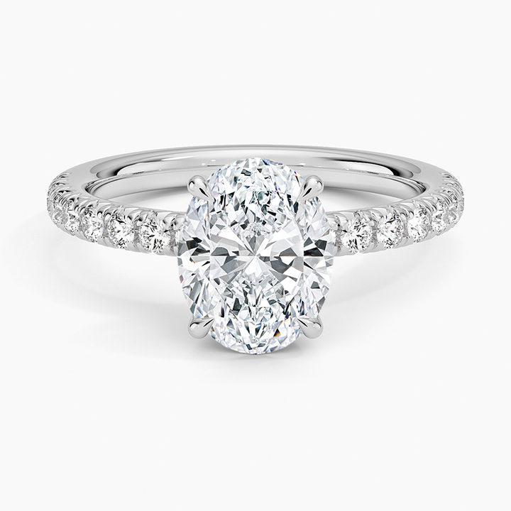 oval cut moissanite pave engagement ring in 14k gold
