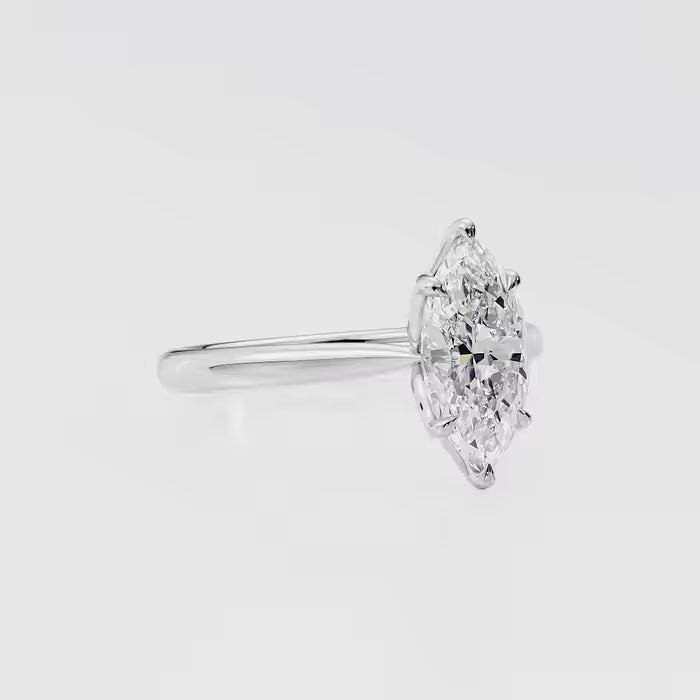 Marquise Cut Diamond Cathedral Engagement Ring for women