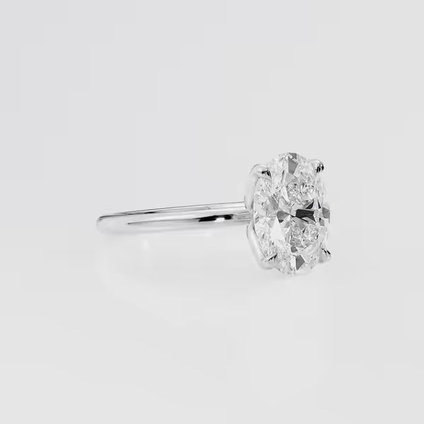 Oval Cut Moissanite Four Prong Solitaire Engagement Ring